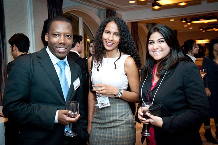 A student networks at a Brandeis career event.